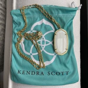 Kendra Scott Long gold necklace with white pendant